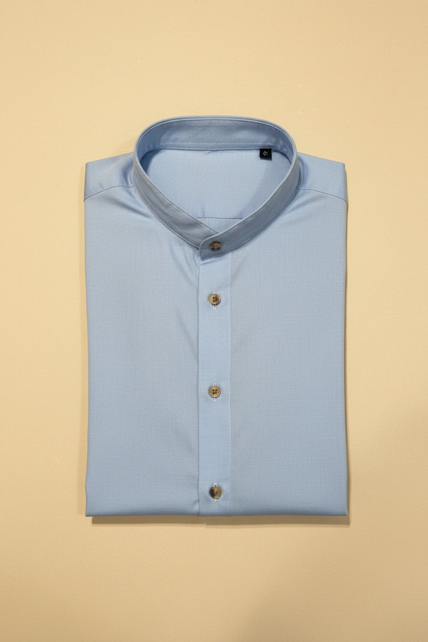 Camisa de manga larga slim fit FITTERS ORIGINALS en azul cielo, vista frontal, tela suave y diseño ajustado para un estilo moderno.